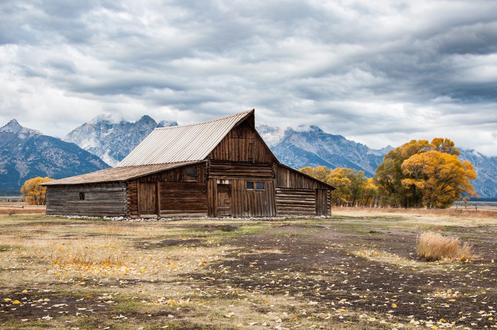 An old wooden barn at Mormon Row in Jackson Hole during the Fall, Grand Teton National Park, Wyoming