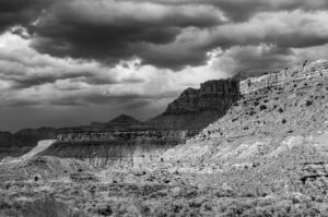 Monochrome image of high ground in Zion National Park beneath stormy skies