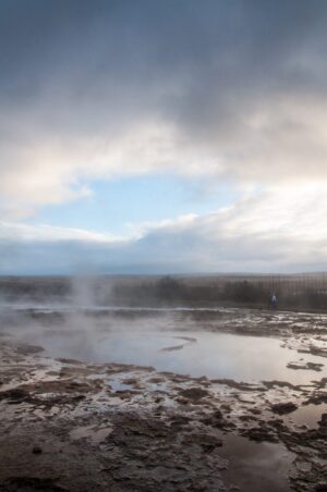 Steam rises from a geysir geothermal field in Southern Iceland
