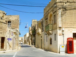 The main street in San Lawrenz on Gozo is quiet during the heat of the day