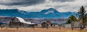 A wide view of the Mormon Row Barns in Grand Teton National Park, USA