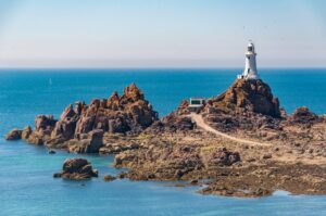 The Corbiere lighthouse on the south west corner of Jersey at low tide