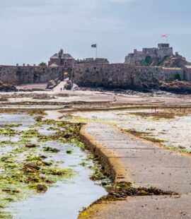 The causeway to Elizabeth Castle lets you walk out during low tides